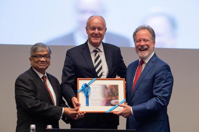 Mr. David Beasley, Executive Director and H.E. Md. Shameem Ahsan Ambassador of the People's Republic of Bangladesh and Executive Board President 2022 present certificates of appreciation to outgoing Ambassadors.  H.E. Dr Ulrich Seidenberger Ambassador and Permanent Representative of Germany.  Photo: Rein Skullerud